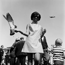 Load image into Gallery viewer, James Barnor: Drum cover girl Erlin Ibreck at Trafalgar Square, London, 1966
